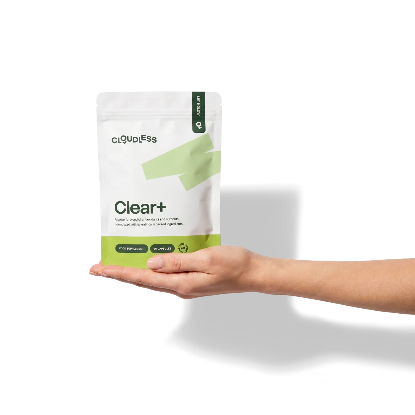Hand mit einem Clear+ Beutel